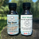 Garden Path Homemade Soap natural beard oil bottles in Bay Rum and Wild Woods scents.
