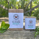 Rosemary Mint Shampoo Bar by Garden Path Homemade Soap - both large and small wrapped shampoo bars on a wooden surface with in and rosemary springs. 100% Natural Ingredients | Made with Beer