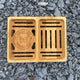 Bamboo Double Soap Dish with Garden Path Homemade Soap label in the bottom of one side. Slats in the bottom of the dish for drainage.