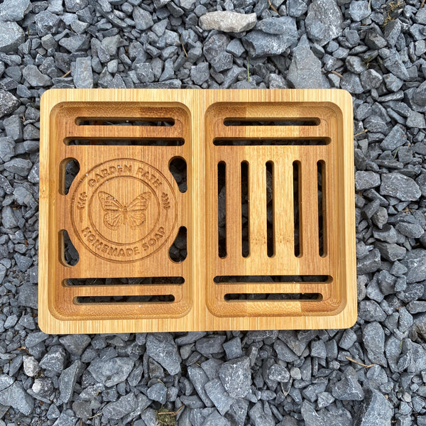 Bamboo Double Soap Dish with Garden Path Homemade Soap label in the bottom of one side. Slats in the bottom of the dish for drainage.