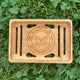 Single Bamboo Soap Dish  with Garden Path Homemade Soap label in the bottom of one side. Slats in the bottom of the dish for drainage.